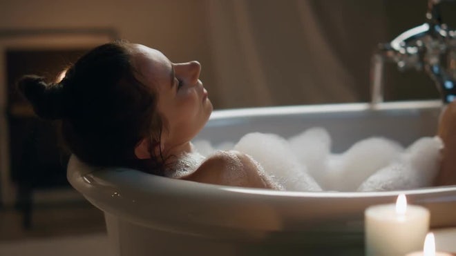 Young woman take bubble bath. Top view, Stock Video