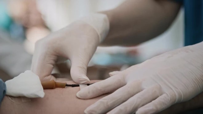 Close-up Of Unrecognizable Nurse Bandaging Arm Of Blood Donor In Clinic by  AnnaStills - Stock Video | Motion Array
