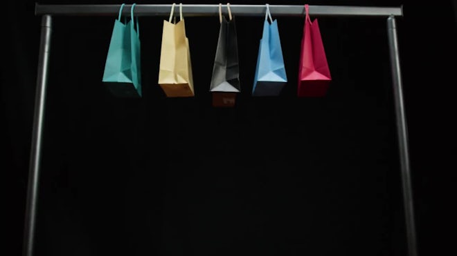 Saks Be-Ribboned and Branded Shopping Bag – Fixtures Close Up