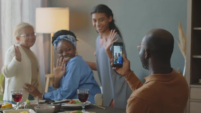 Dad Filming Wife And Kids With Phone - Stock Video | Motion Array