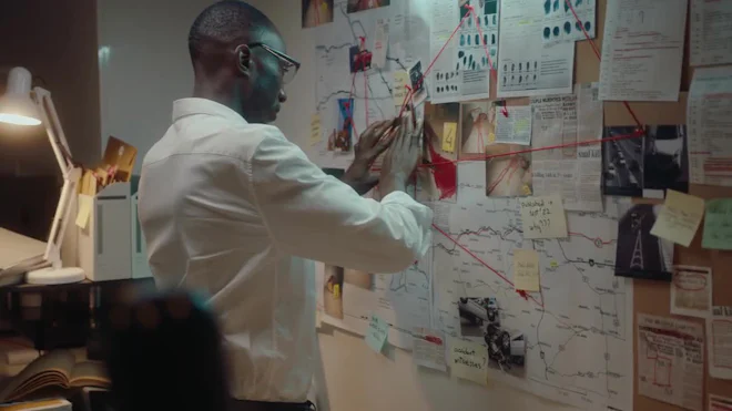 Detective Pinning Crime Scene Photo To Investigation Board by YUKI FILM -  Stock Video | Motion Array