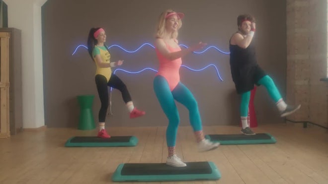 Doing Aerobics In 80s Outfits - Stock Video