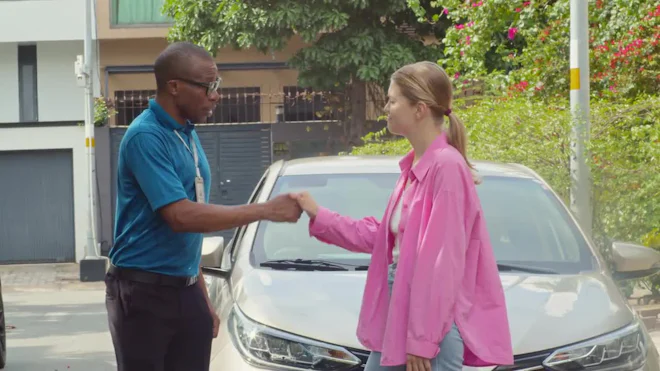 Driving Instructor Shaking Hand Of Female Student After Passed Exam - Stock  Video | Motion Array