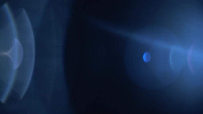 Blue center optical lens flares on background 4702991 Stock Video