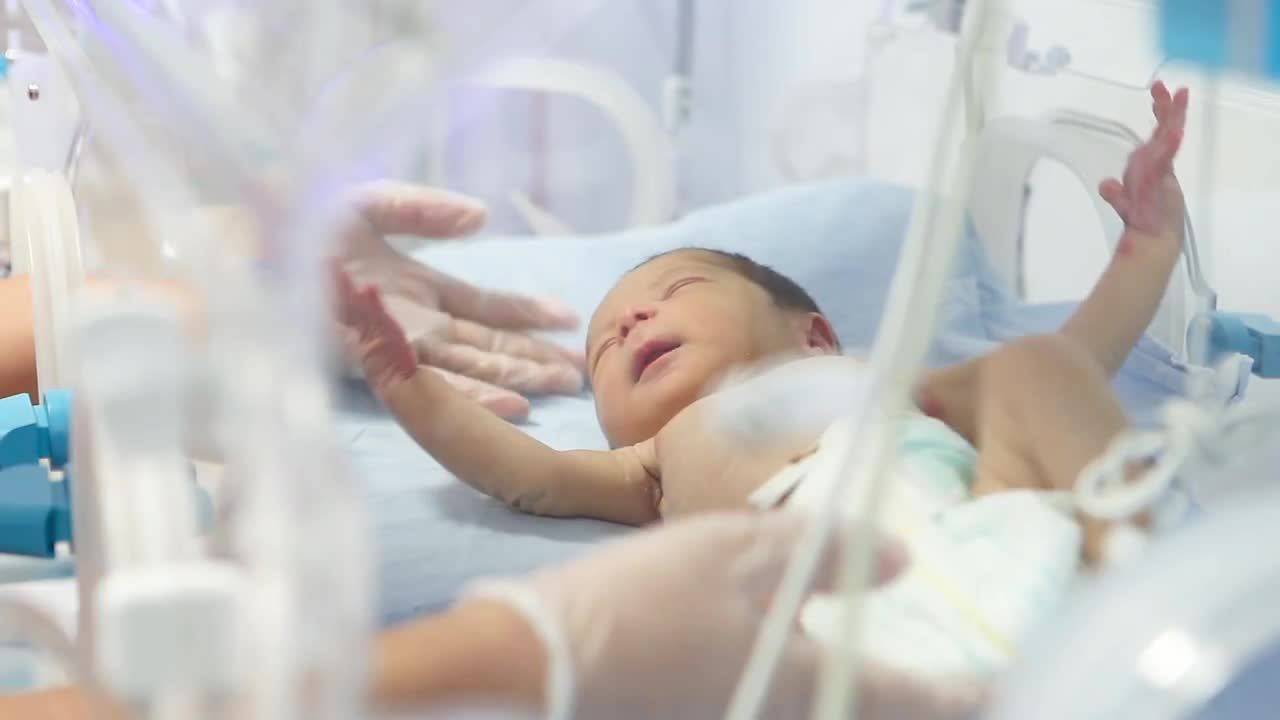 Newborn Baby In A Cot Stock Video Motion Array