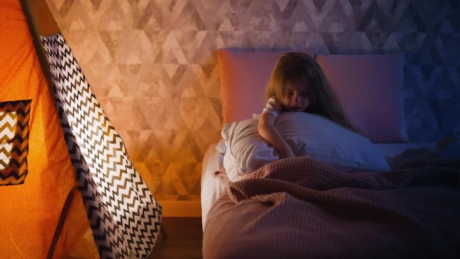 Young Girl Crying In Bed - Stock Video | Motion Array