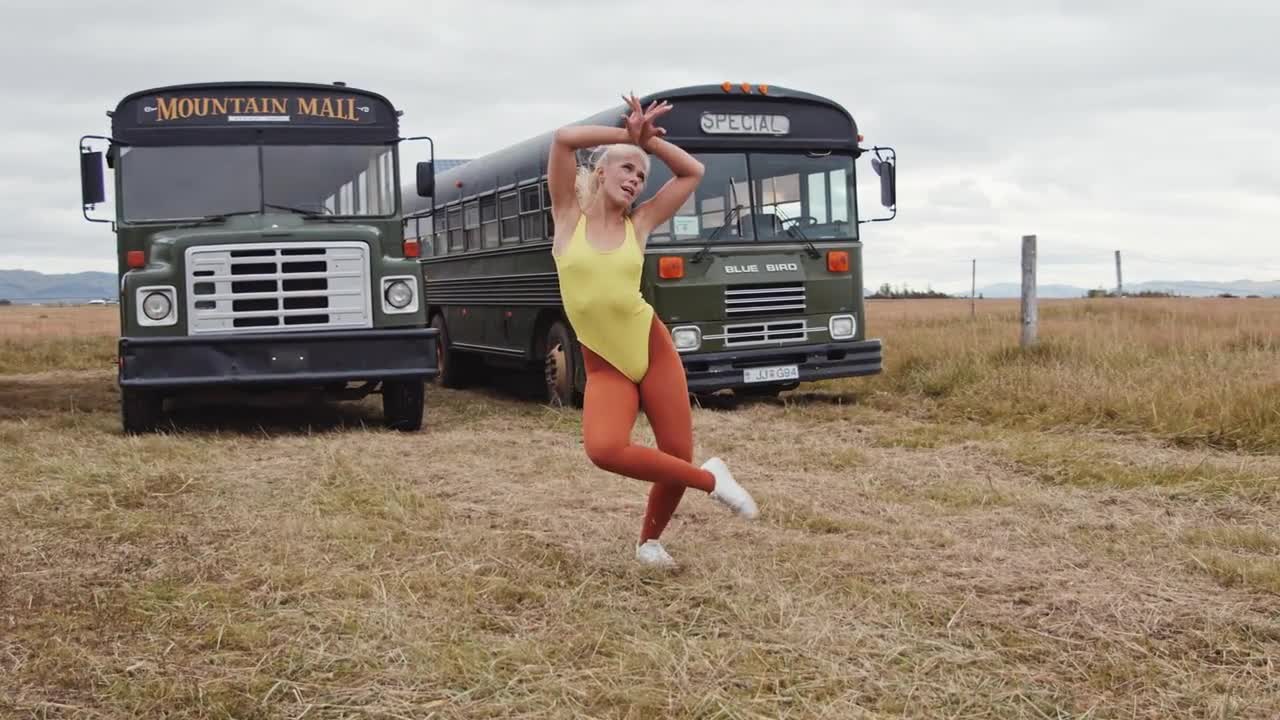 Woman Dancing In Leotard By Busses Stock Video Motion Array
