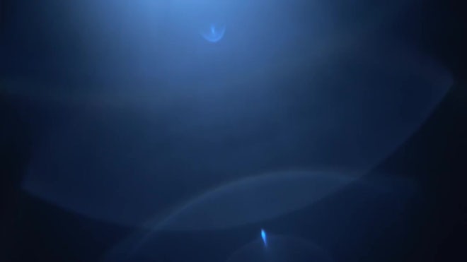 Blue center optical lens flares on background 4702991 Stock Video at  Vecteezy