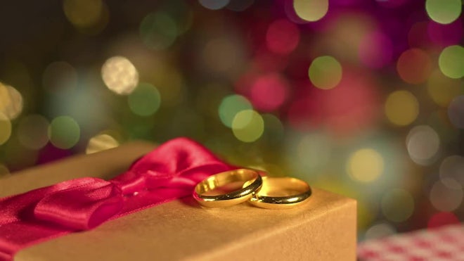 Wedding Rings On Colorful Bokeh - Stock Video | Motion Array