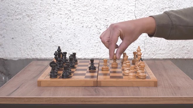 Man thinking about next chess move gets checkmate - Free Stock Video