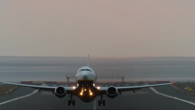 airplanes taking off in the morning