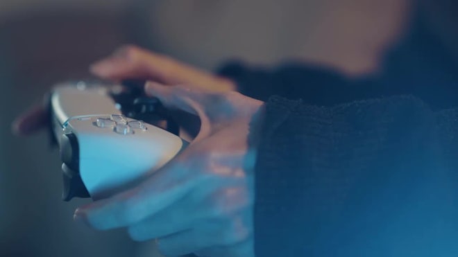 Gamer using vr glasses and controller to play video games. Man with virtual  reality goggles holding joystick in front of computer, playing online game.  Player having fun with games Stock Photo 