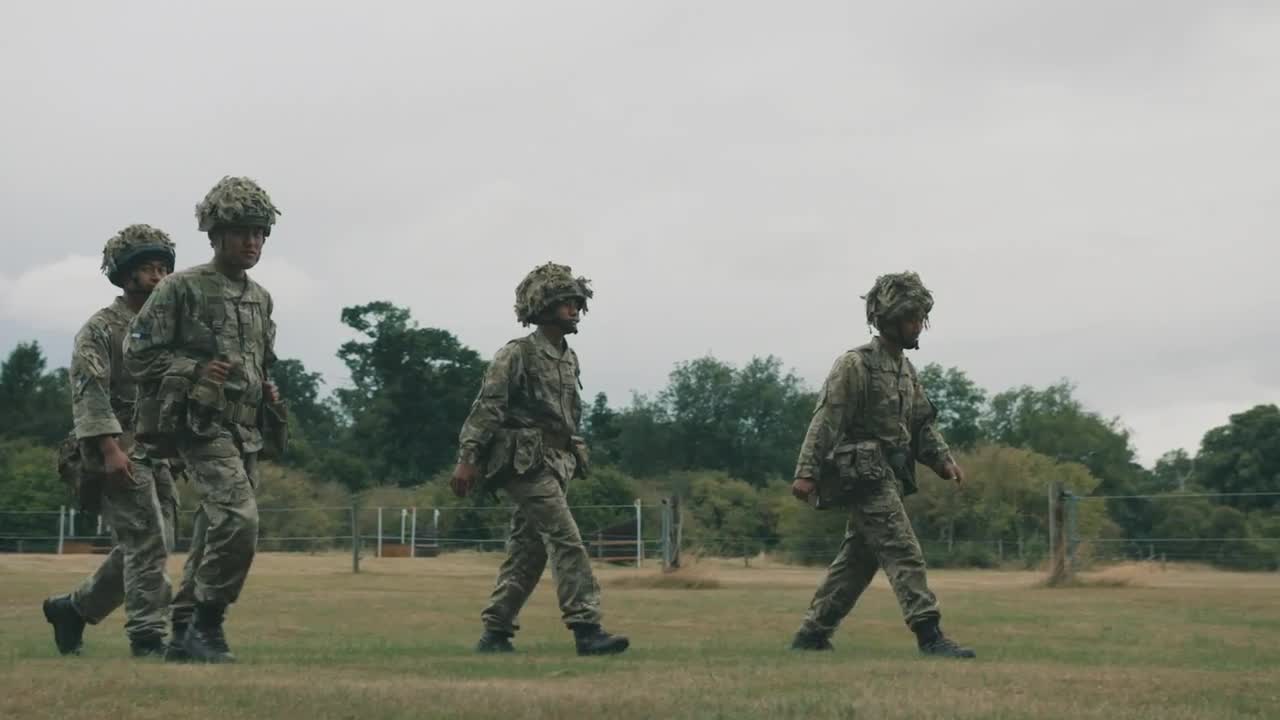 Soldiers Walking In A Field by Arthur Cauty - Stock Video | Motion