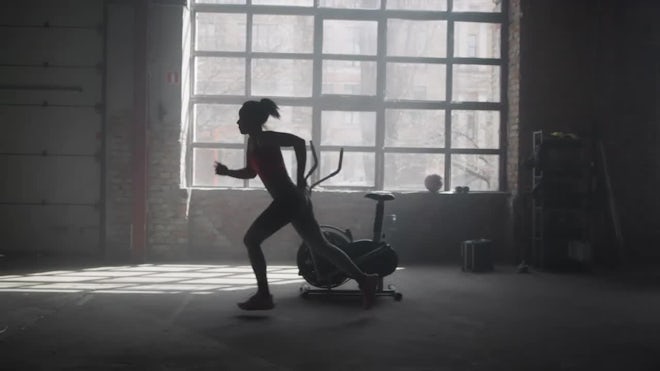Athlete Woman Running In A Gym - Stock Video