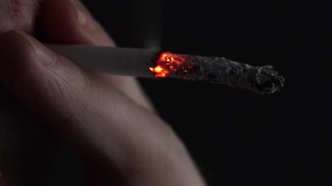 Man Lights A Cigarette In Dark - Stock Video