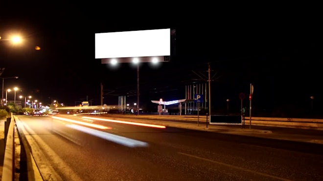highway billboard night