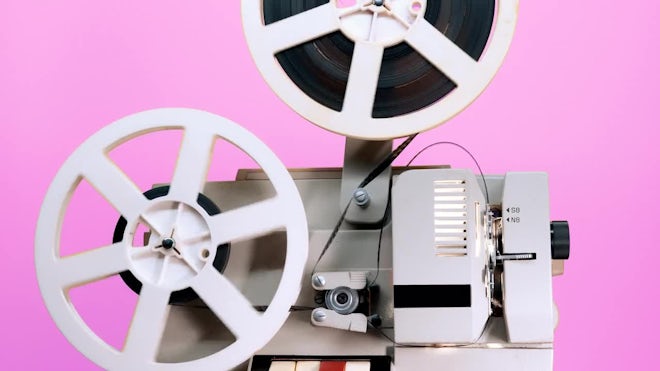 Old 8Mm Film Projector Showing Film - Stock Video