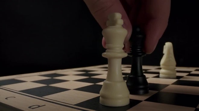 Put the chess piece on a chessboard, end, Stock Video