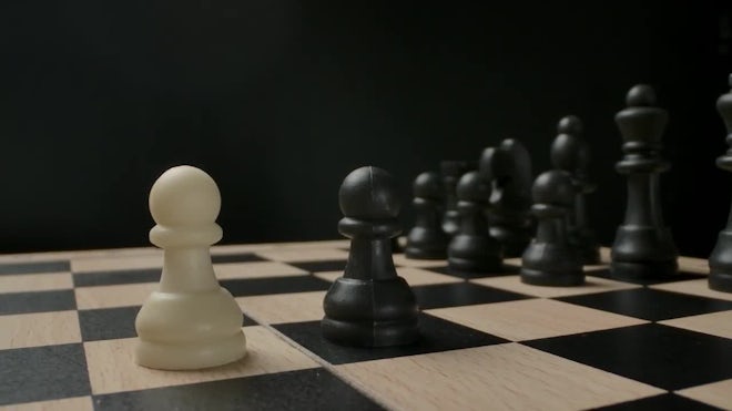 Chess figures on a dark background with smoke and fog. Epic chess