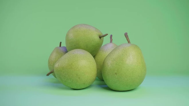 Fresh organic pears on a white background