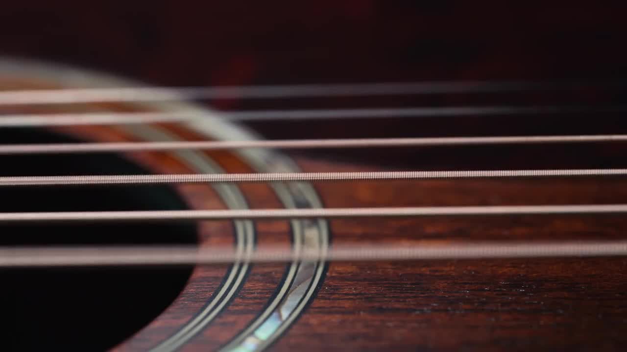 Acoustic Guitar Strings Vibrating. Macro Stock Video Motion Array