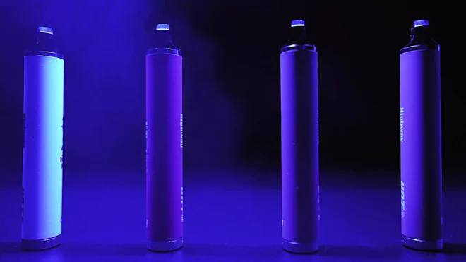 E-cigarette Or Vape In Blue Neon Lighting And Smoke. Concept Of Bad Habits  by Karim3run - Stock Video