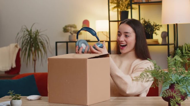 Woman Shopper Unpacking Cardboard Box Delivery Parcel Online