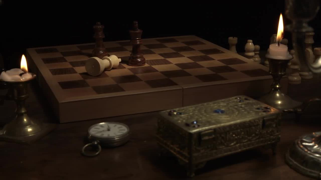The Chess Piece Of The White King Falls On The Chessboard