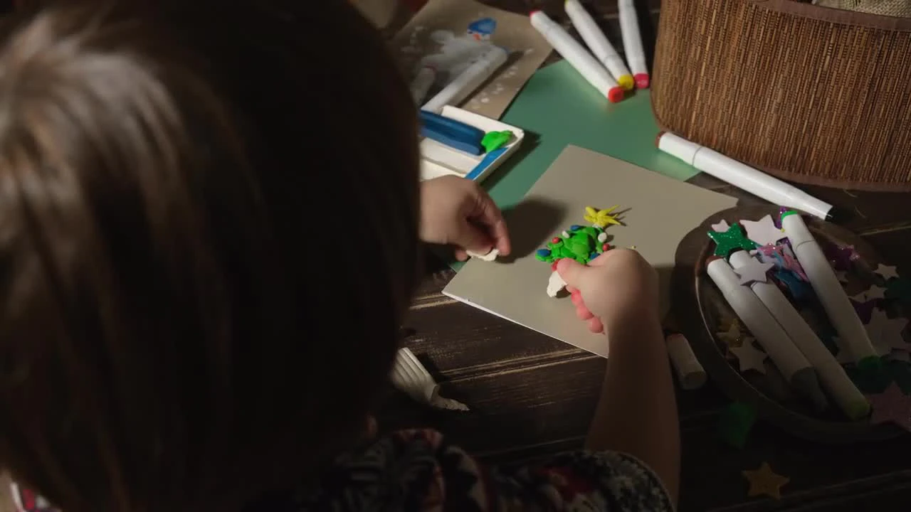 Little Girl Using Glue Stick by Chudakov - Stock Video | Motion Array