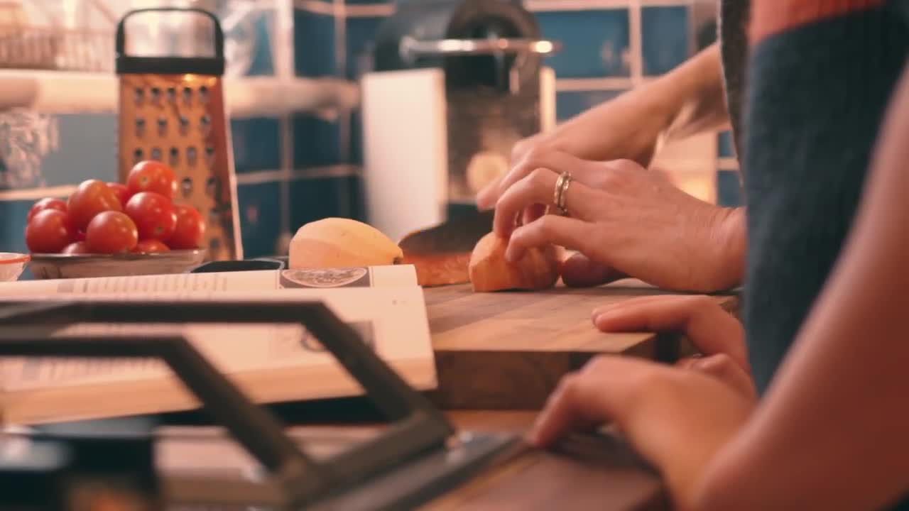 Lady Cutting Vegetables - Stock Video | Motion Array
