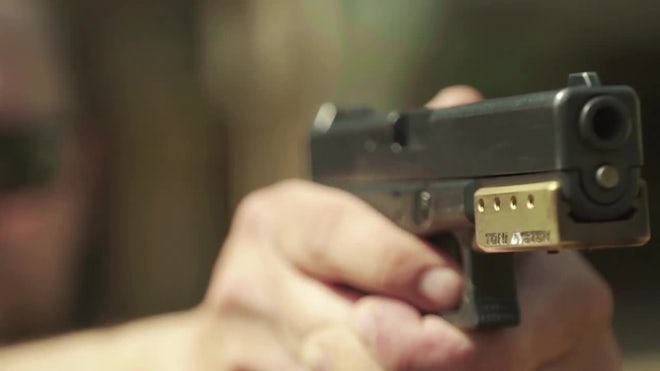 Bullet casings from a 5mm pistol, Military Stock Footage ft. 5mm &  ammunition - Envato Elements
