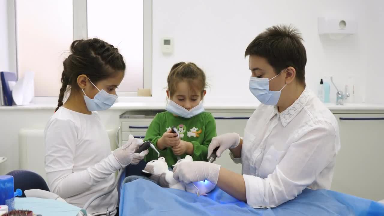 Girls Playing Dentist Stock Video Motion Array