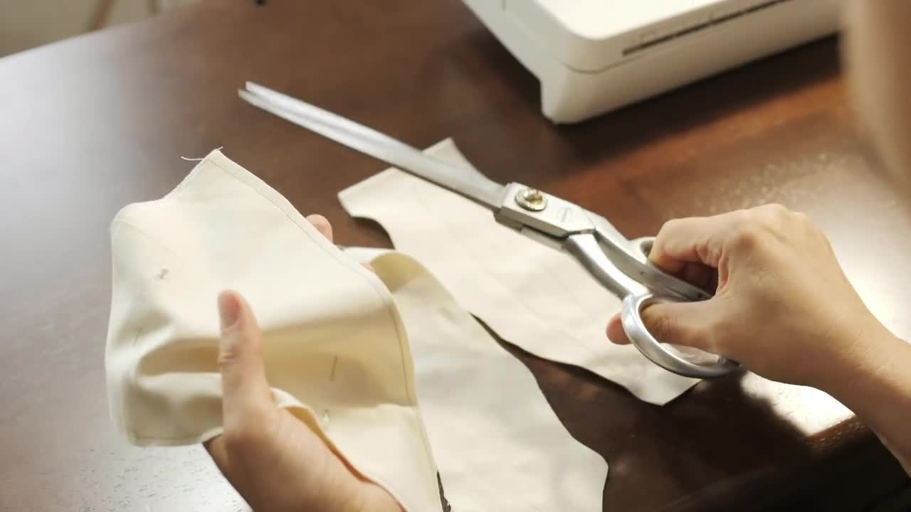 Cutting Fabric With Large Scissors Stock Video Motion Array