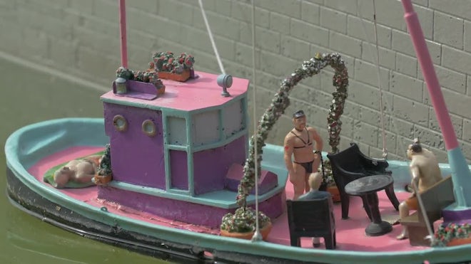 Close Up Of A Miniature Pink Boat - Stock Video