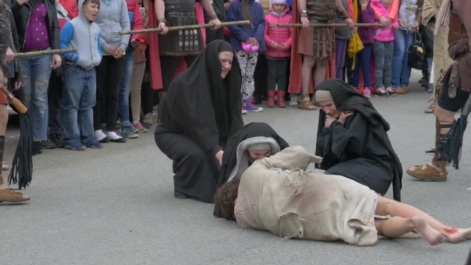 Women Crying At "The Crucifixion... - Stock Video | Motion Array