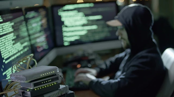 A female hacker in action using the co, Stock Video