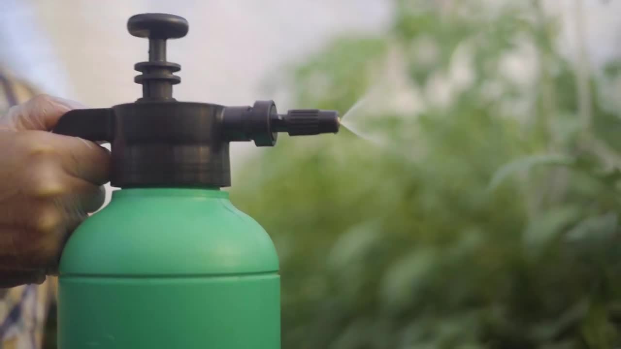 A Greenhouse Spray Bottle - Stock Video | Motion Array