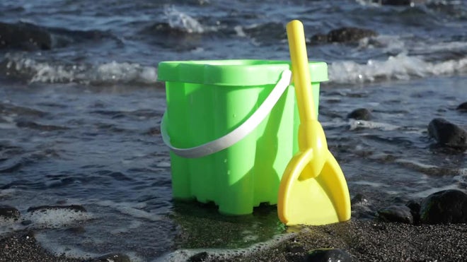 sand bucket and shovel on beach