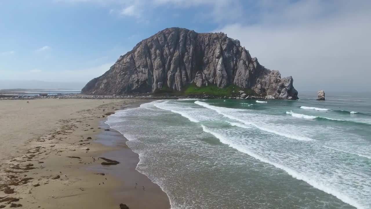 Low Aerial Approach On Morro Rock - Stock Video | Motion Array