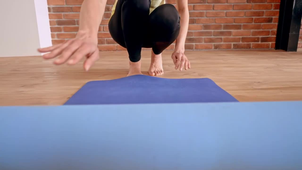 Unrolling A Yoga Mat CloseUp Stock Video Motion Array