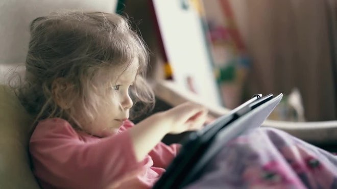 Nimble toddler stamps feet in muddy pudd, Stock Video