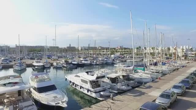 Wide Angle Shot Of Port Olympic: Stock Video