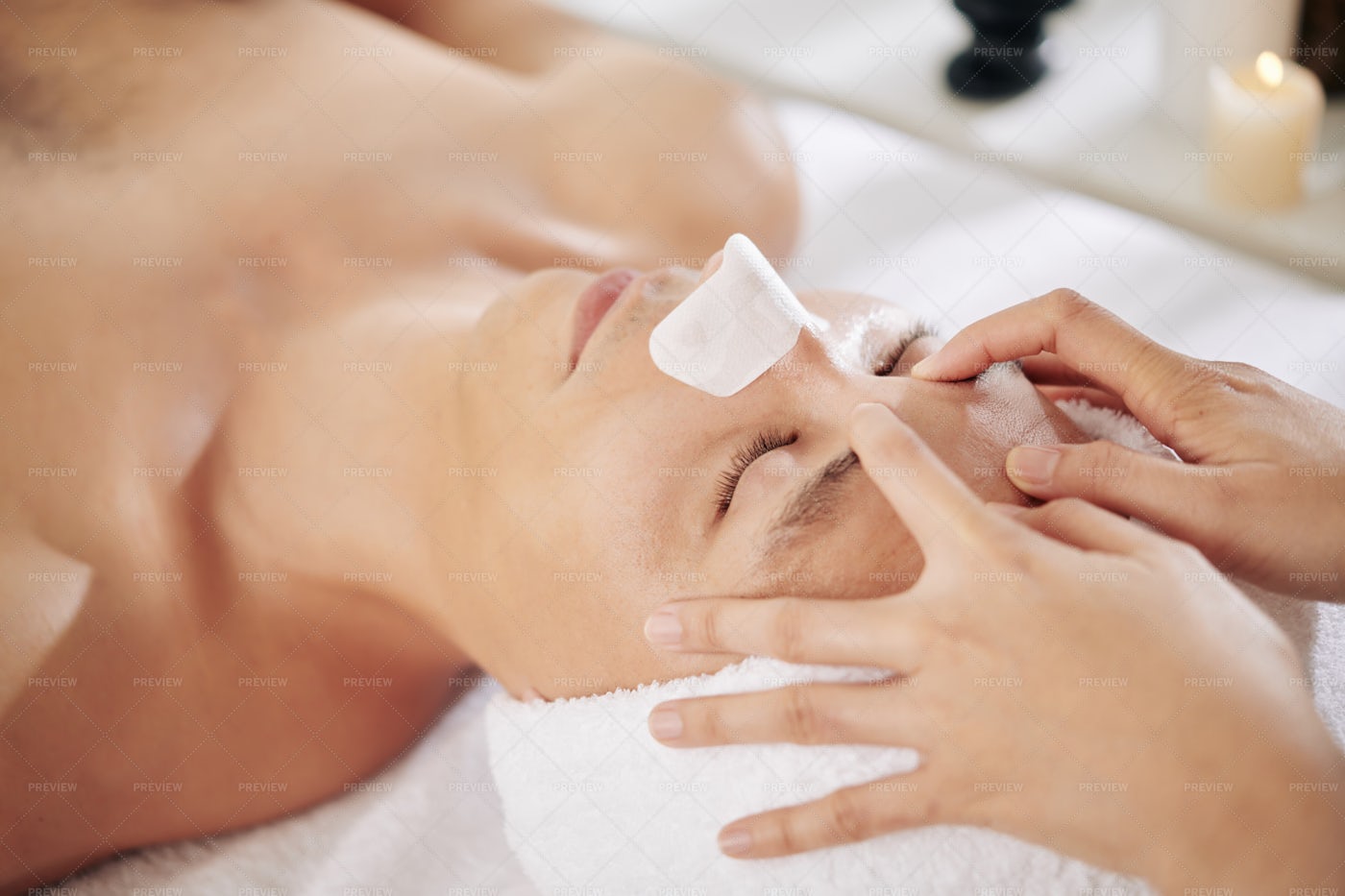 Rejuvenating Face Massage For Man: Stock Photos