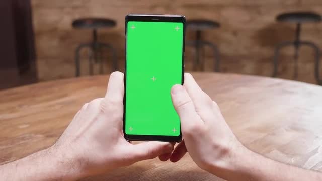 Cellphone With Green Screen: Stock Video