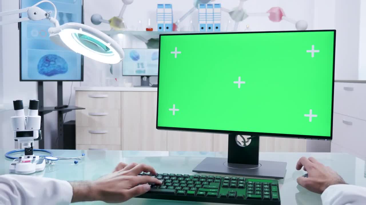Lab PC With Green Screen Stock Video Motion Array