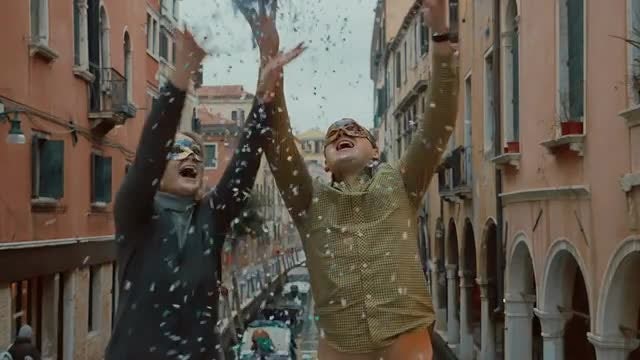 Masked Couple Throwing Confetti: Stock Video