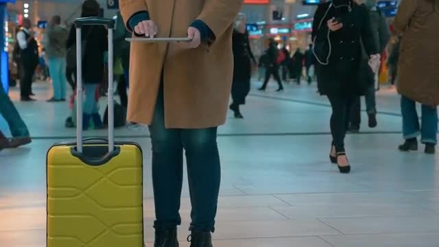 Using Tablet At Airport: Stock Video