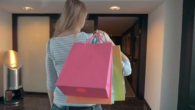 Woman With Shopping Bags: Stock Video