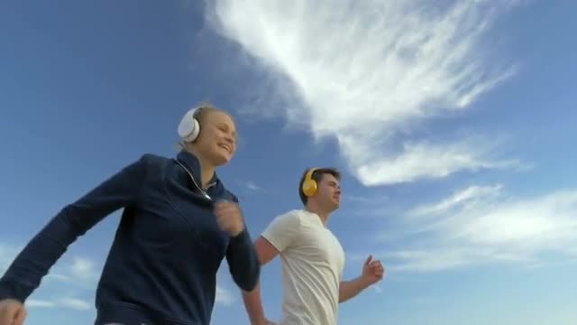 Couple Jog Together: Stock Video