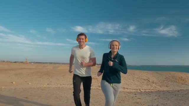 Running With Headphones: Stock Video